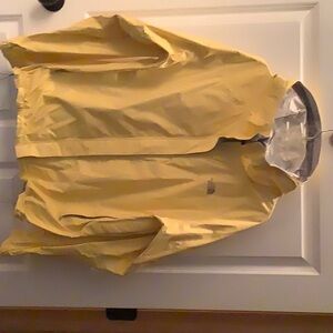 Womens North Face yellow rain/wind water repellant jacket